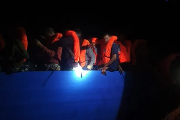 Rescued migrants on deck