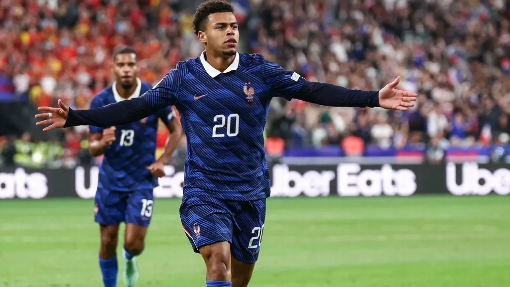 France strikes late to overcome brave Belgium